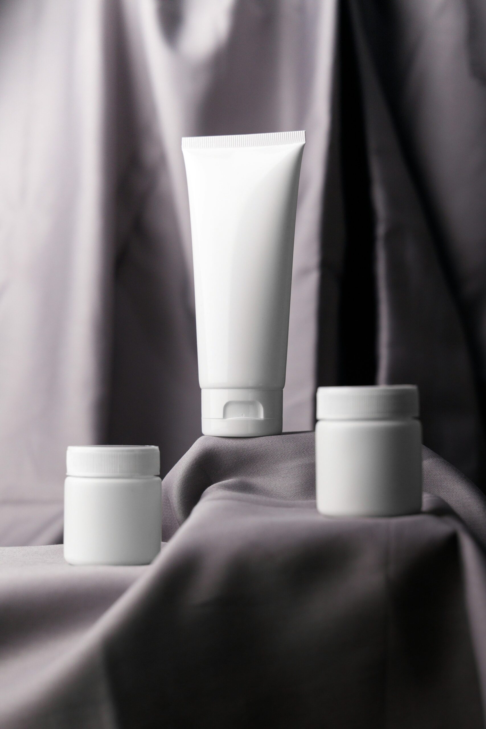 a couple of white containers sitting on top of a table